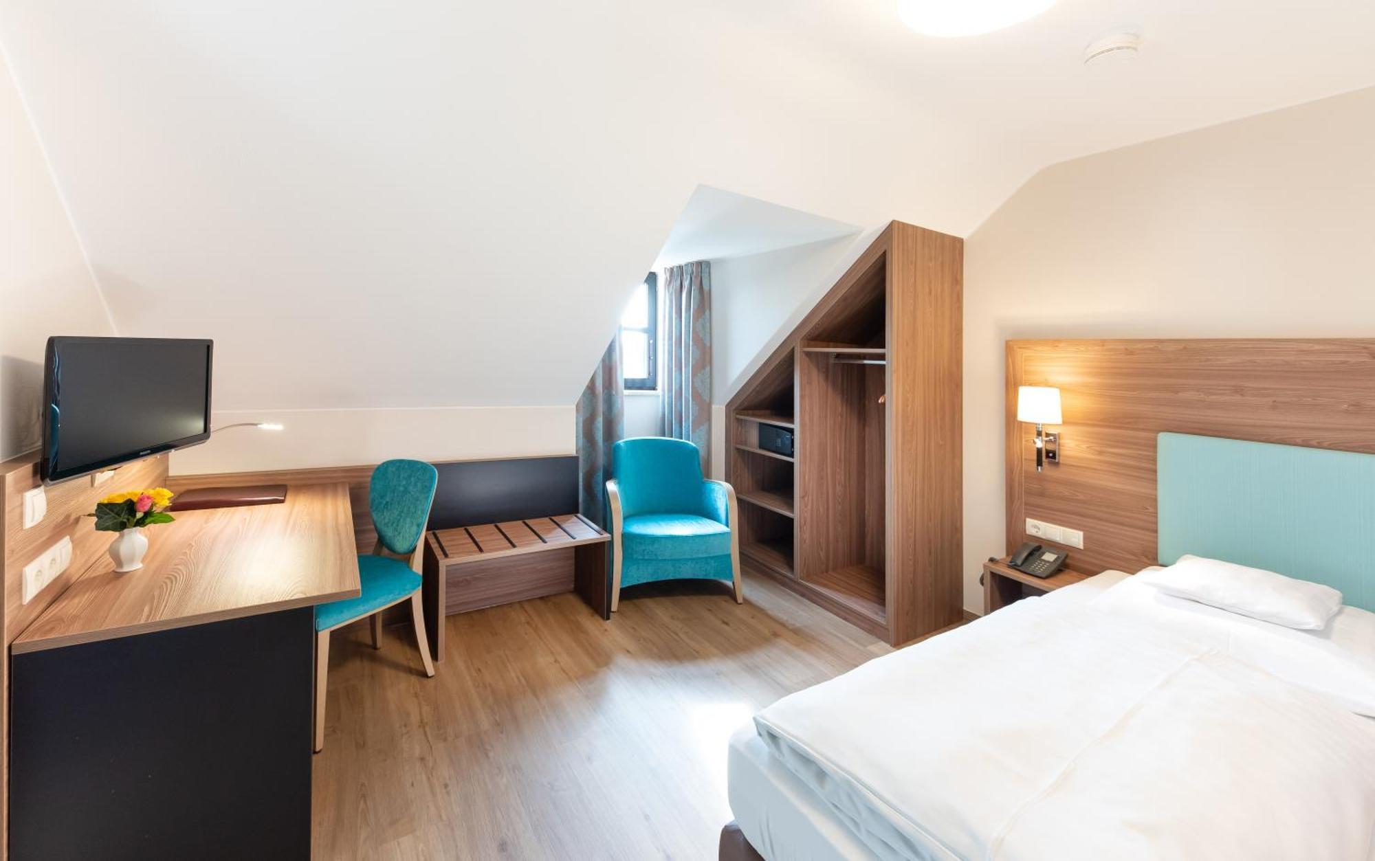 Hotel Gumberger GmbH Garni Neufahrn bei Freising Zimmer foto